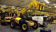 JCB telehandler with ardent system next to ardent van