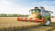 Combine harvester working in a field