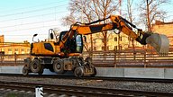 Material handler on rail